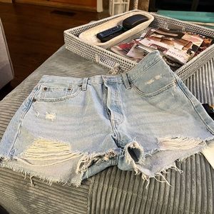 Levis 501 5 button distressed jean shorts
